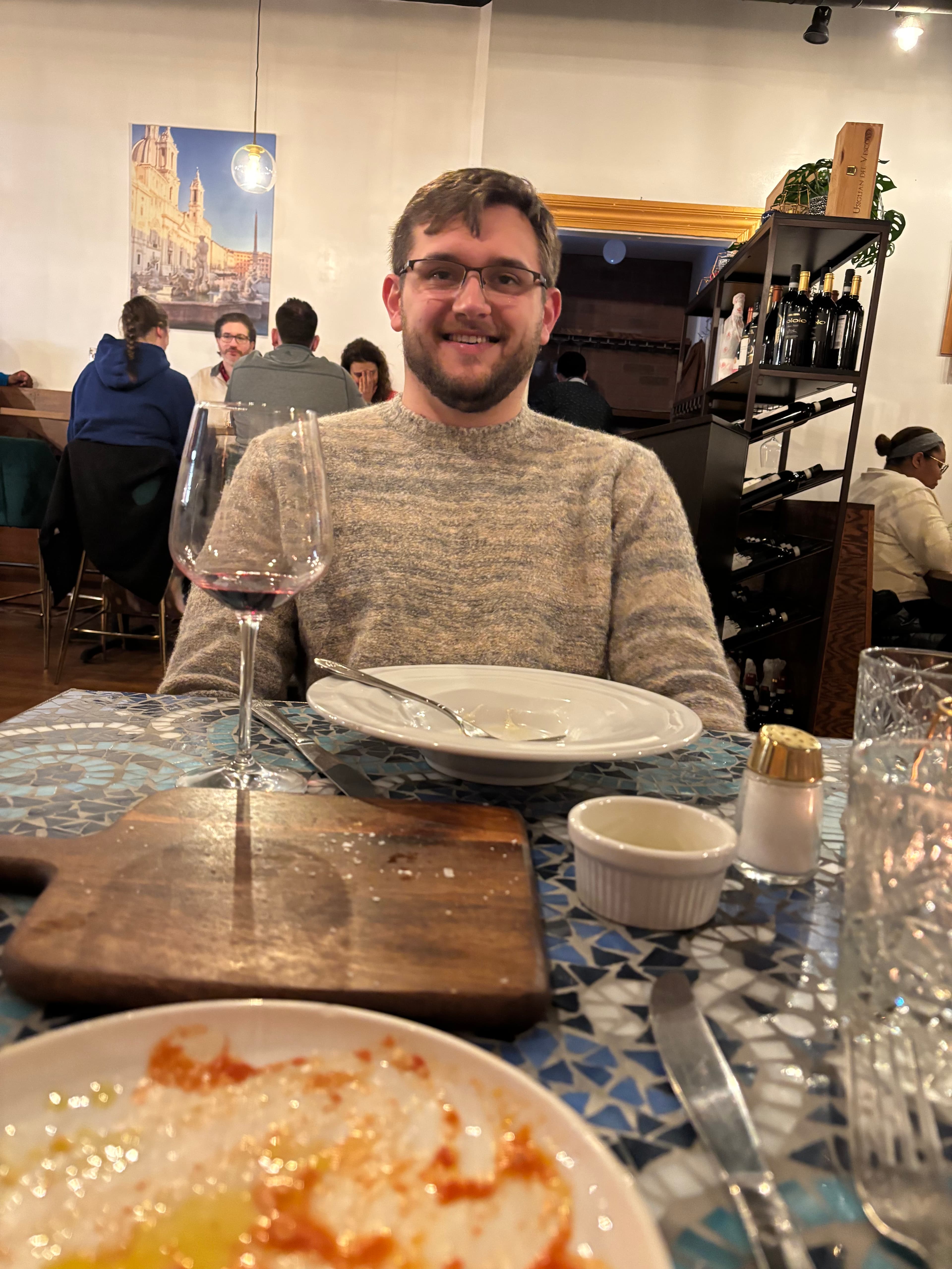 Me smiling at dinner at Pelino's Pasta